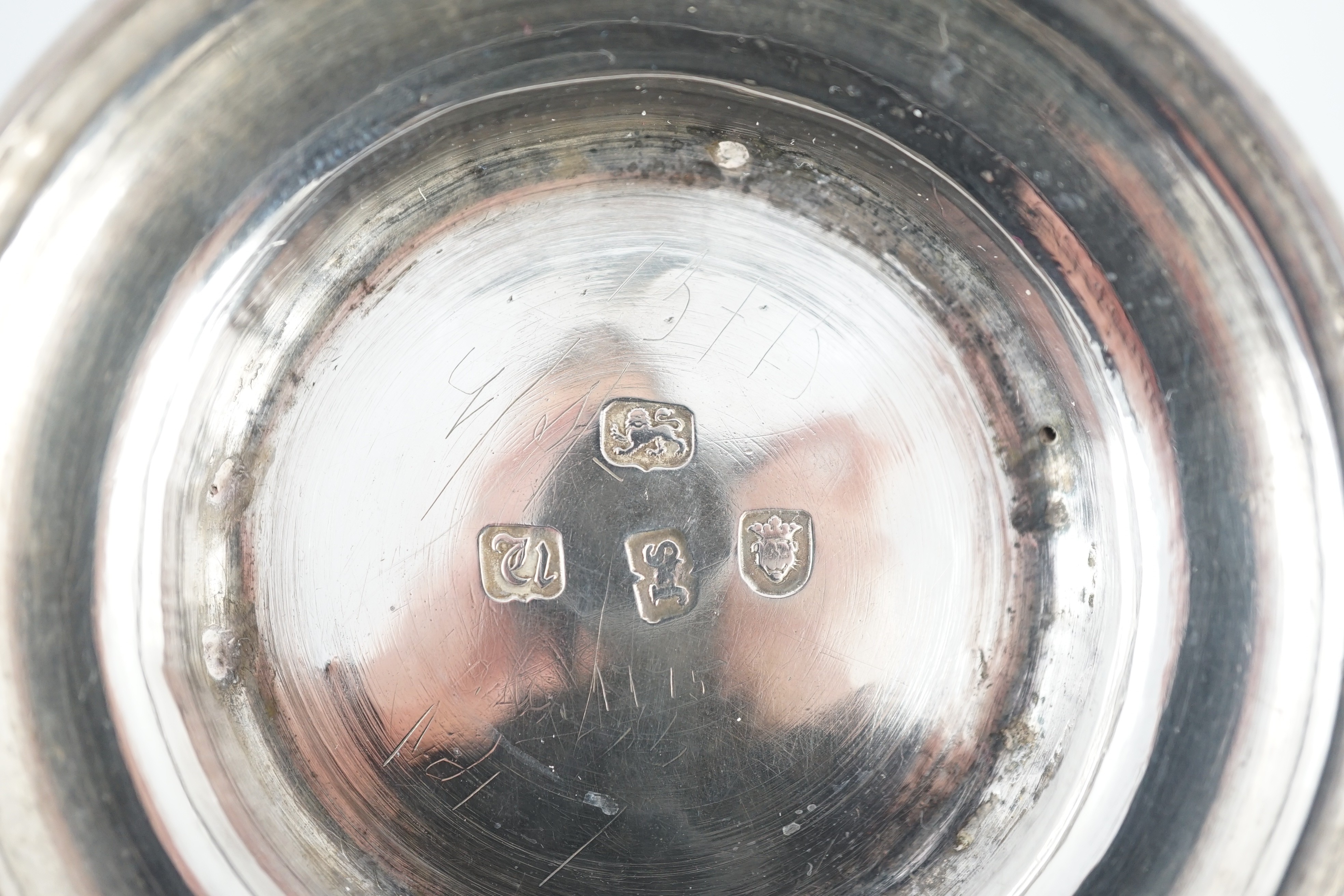 A George III silver baluster mug, later embossed with continuous hare coursing scene, John Scofield